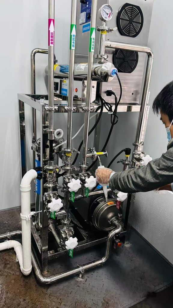 A detailed view of Globaluf's ultrapure water system featuring an integrated UV sterilizer and ozone generator, housed within a sanitary stainless steel frame with precise piping, valves, and control elements, ensuring ultimate microbial control and Total Organic Carbon (TOC) reduction.