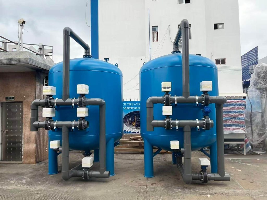 Two parallel carbon steel anti-corrosion quartz sand filters used for reservoir surface water pre-treatment.