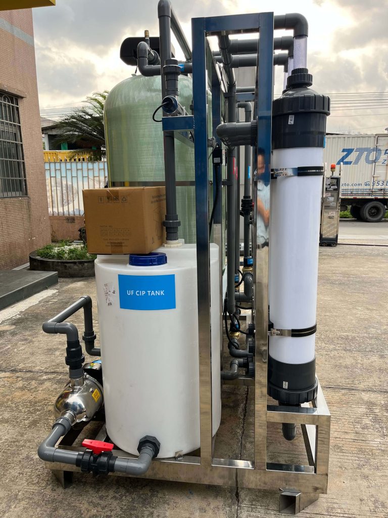 Side profile of Globaluf compact UF water treatment plant during factory testing before export to Malaysia.