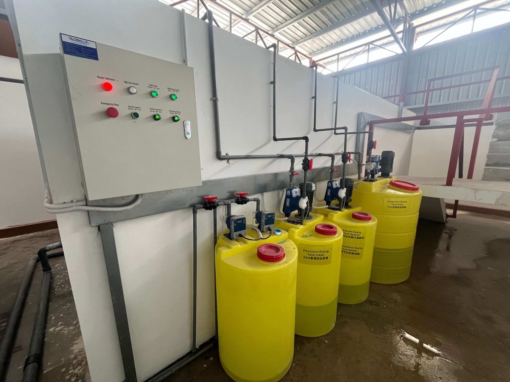 Automated Chemical Dosing Station with Buckets and Metering Pumps